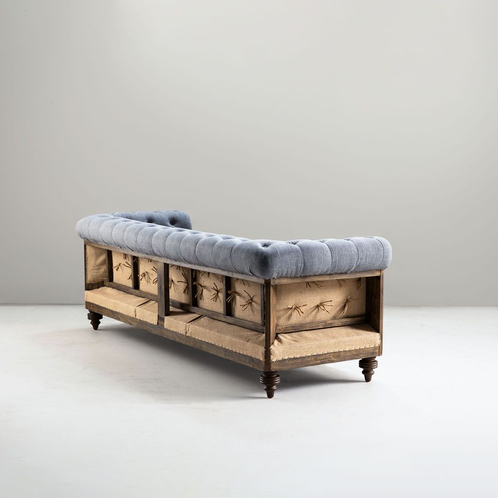deconstructed chesterfield style sofa with wooden frame
