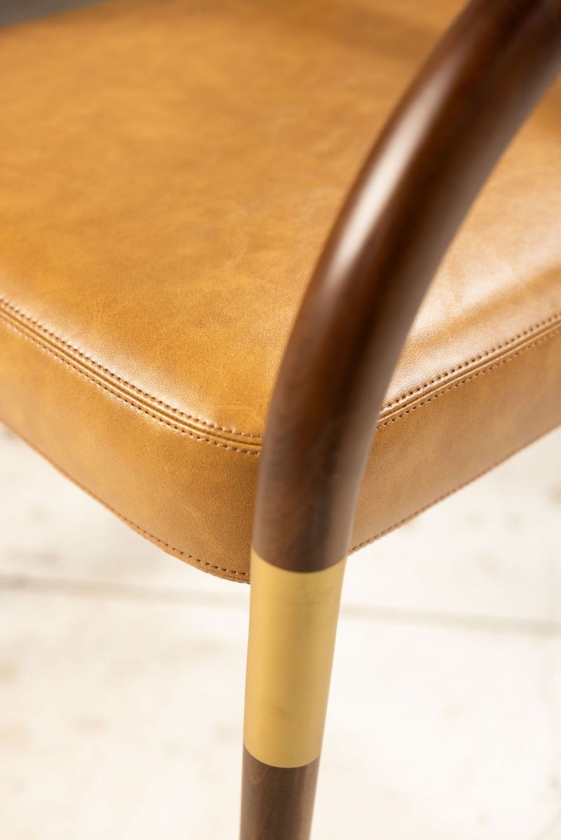 leather and wood tub chair with gold detail