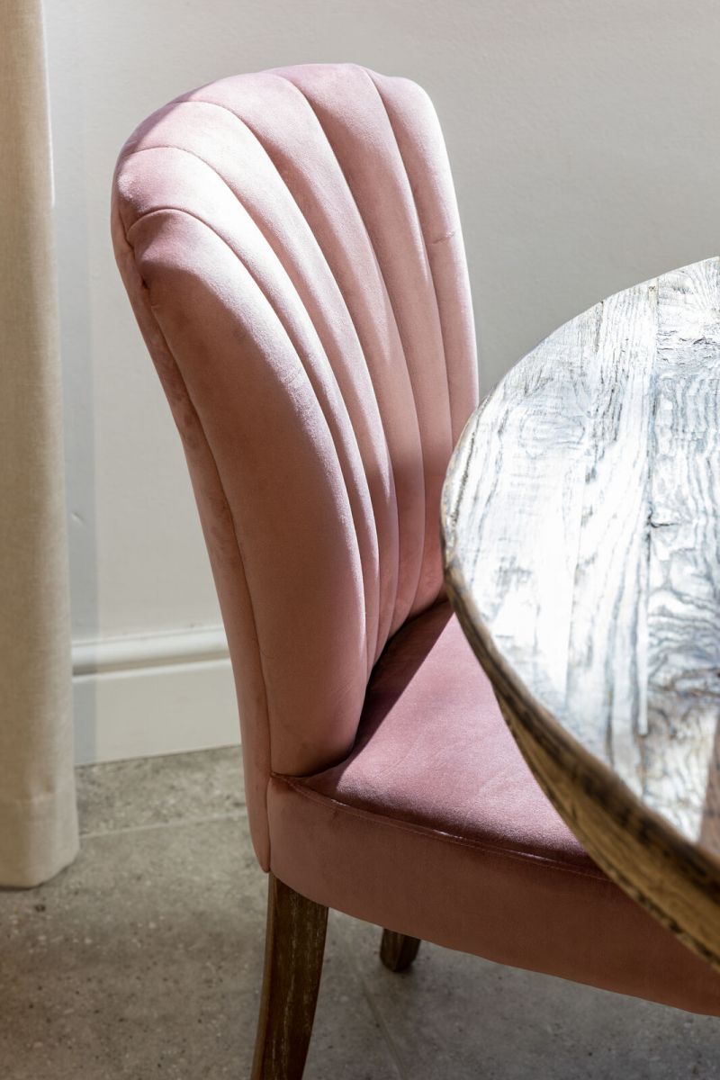 Upholstered dining chair with fan back upholstered detail 