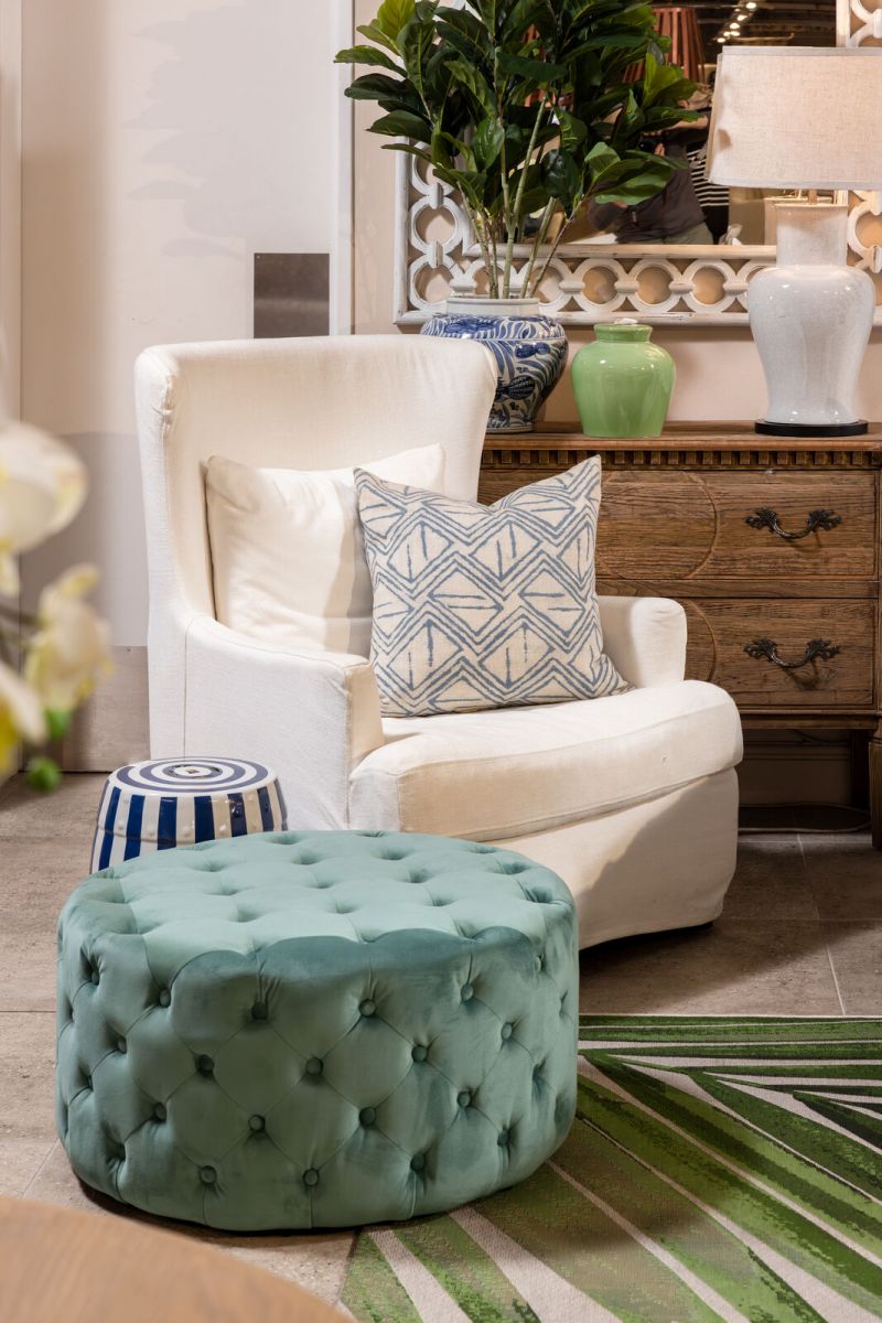 Round deep buttoned ottoman in velvet