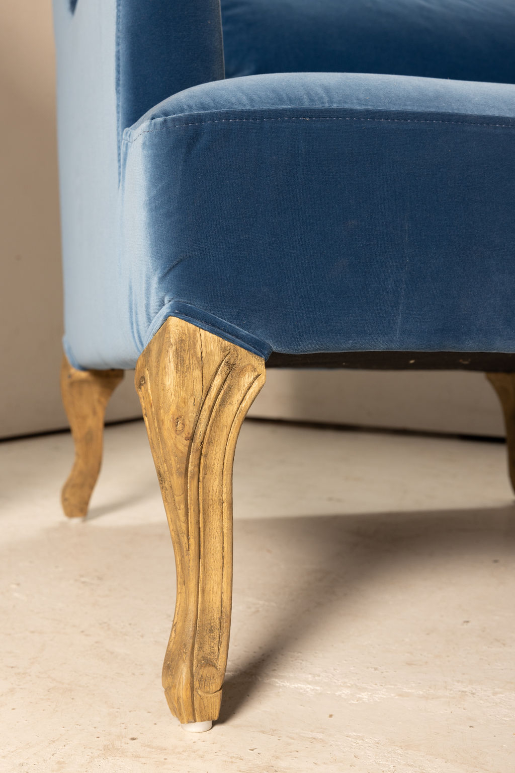 blue velvet wingback with oak legs Château collection