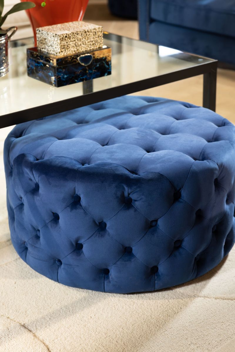 Round deep buttoned ottoman in velvet