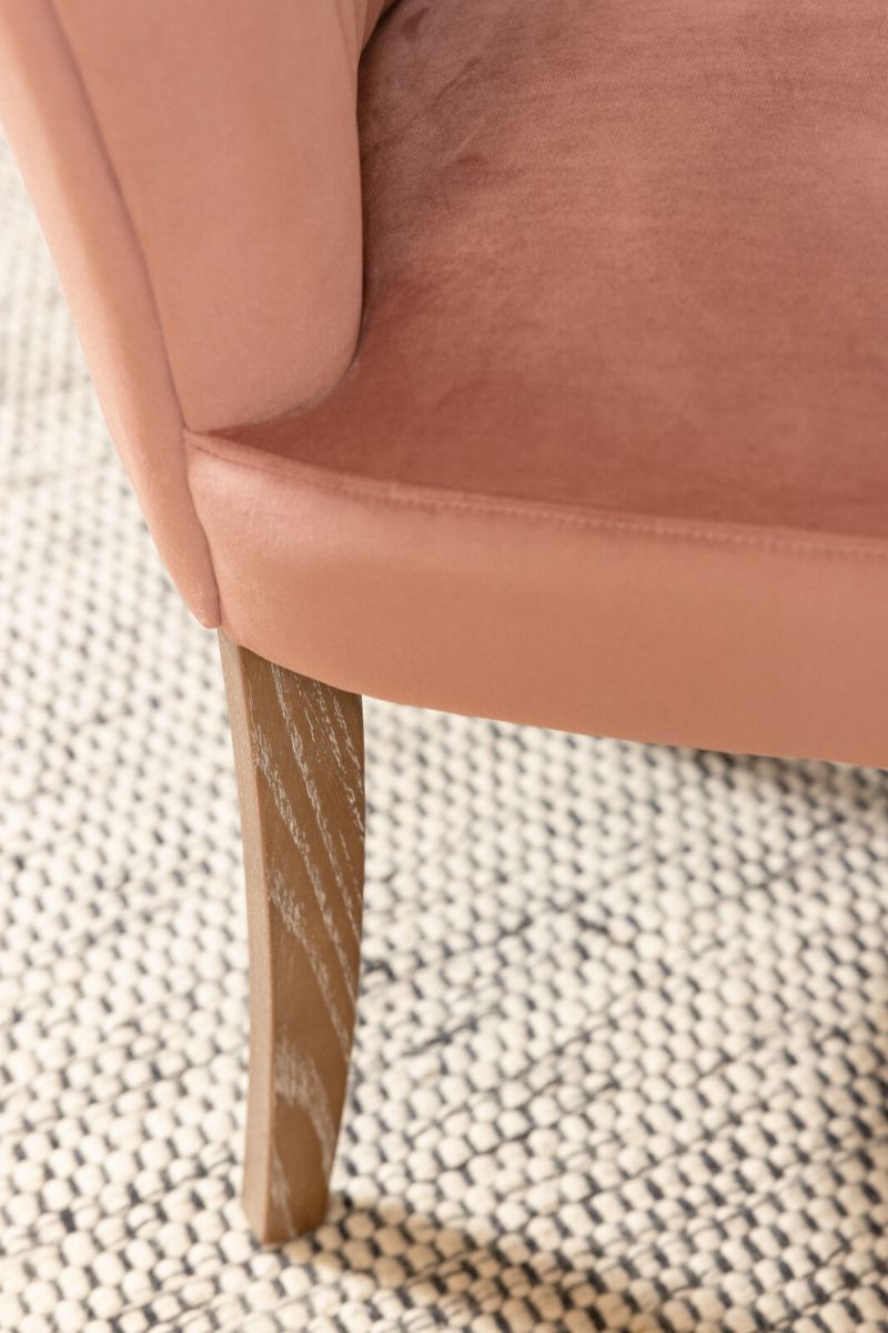 Upholstered dining chair with fan back upholstered detail 