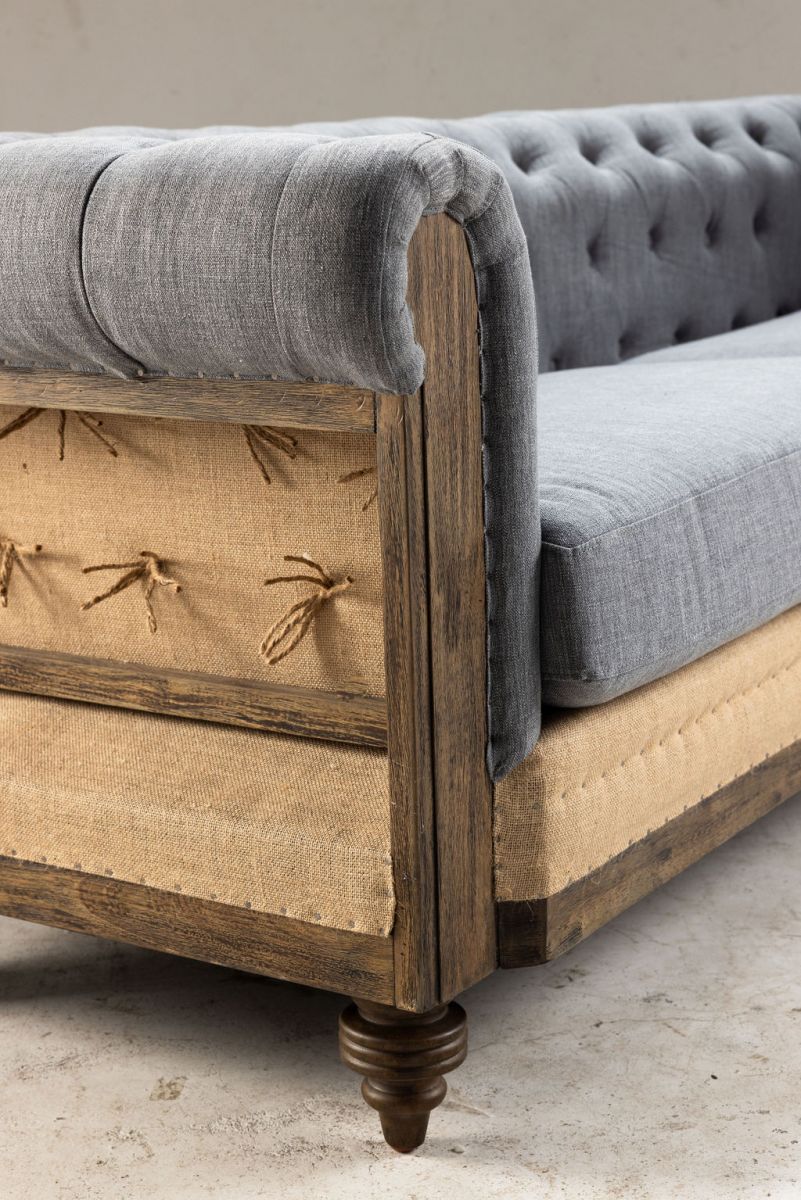 deconstructed chesterfield style sofa with wooden frame