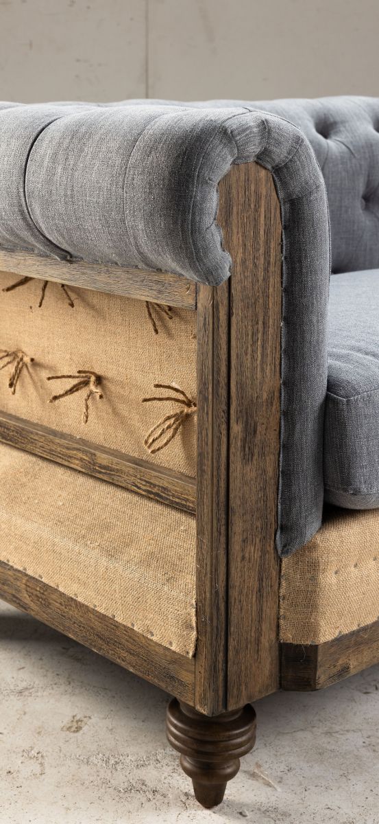 deconstructed chesterfield style sofa with wooden frame