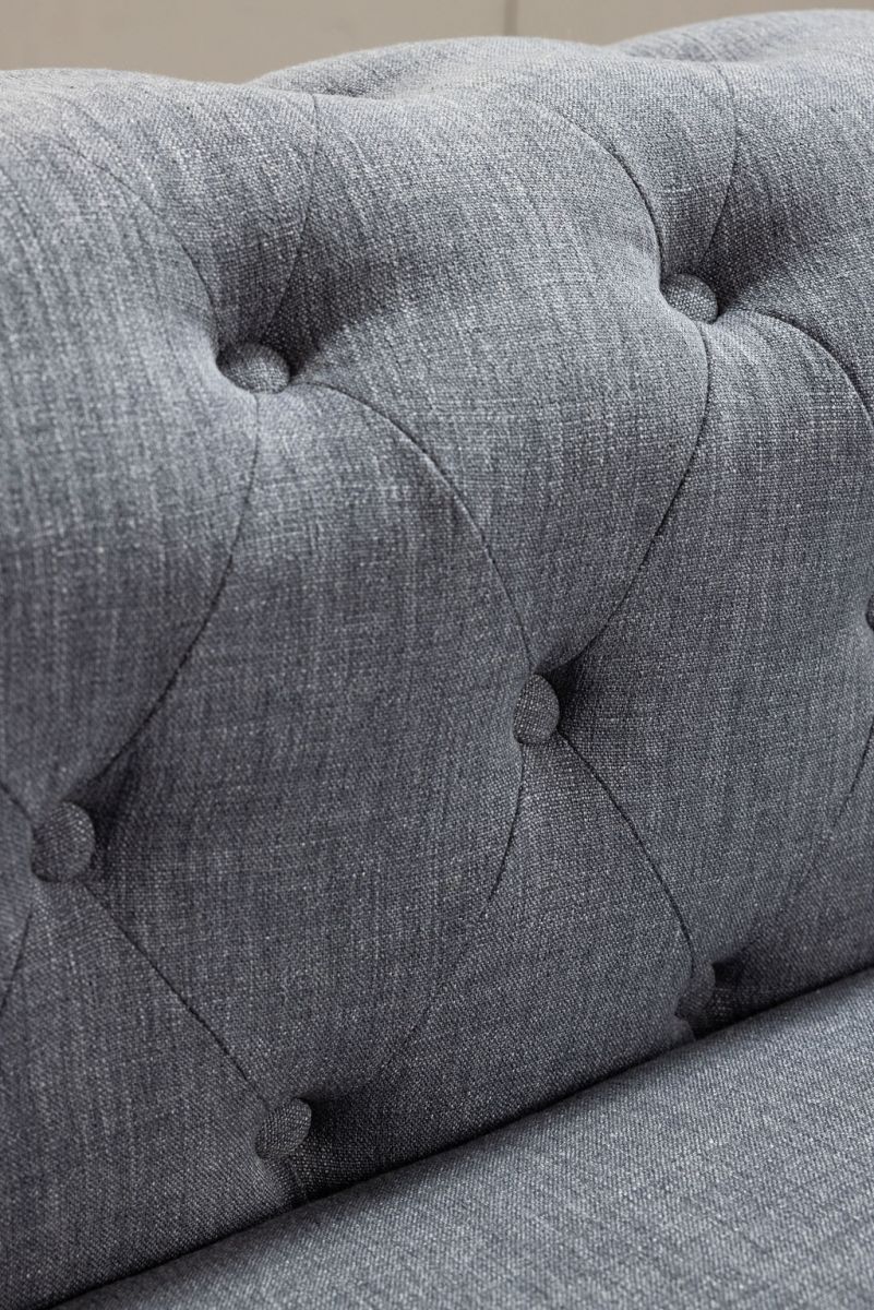 deconstructed chesterfield style sofa with wooden frame