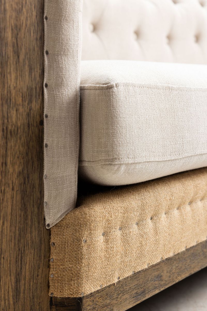deconstructed chesterfield style sofa with wooden frame