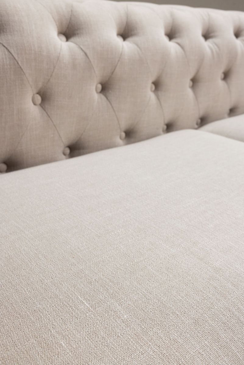 deconstructed chesterfield style sofa with wooden frame