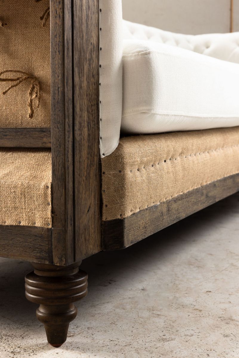 deconstructed chesterfield style sofa with wooden frame
