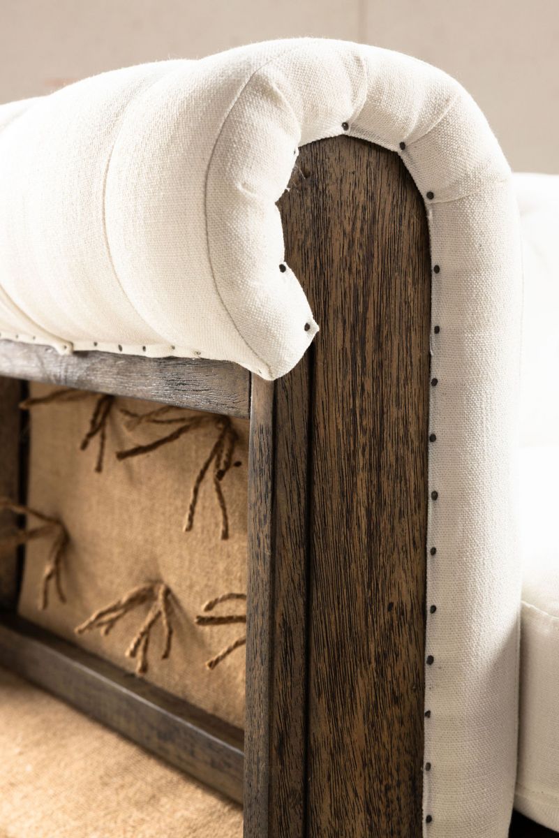 deconstructed chesterfield style sofa with wooden frame