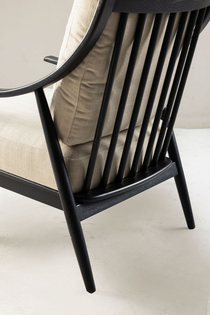 Modern armchair with black frame grey upholstery 