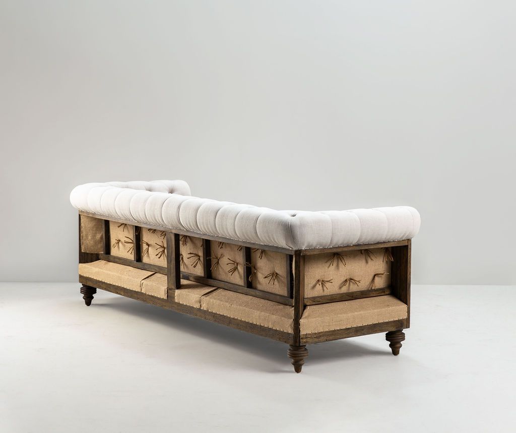 deconstructed chesterfield style sofa with wooden frame