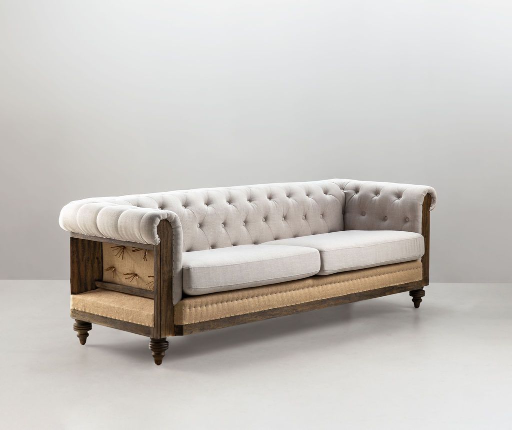 deconstructed chesterfield style sofa with wooden frame