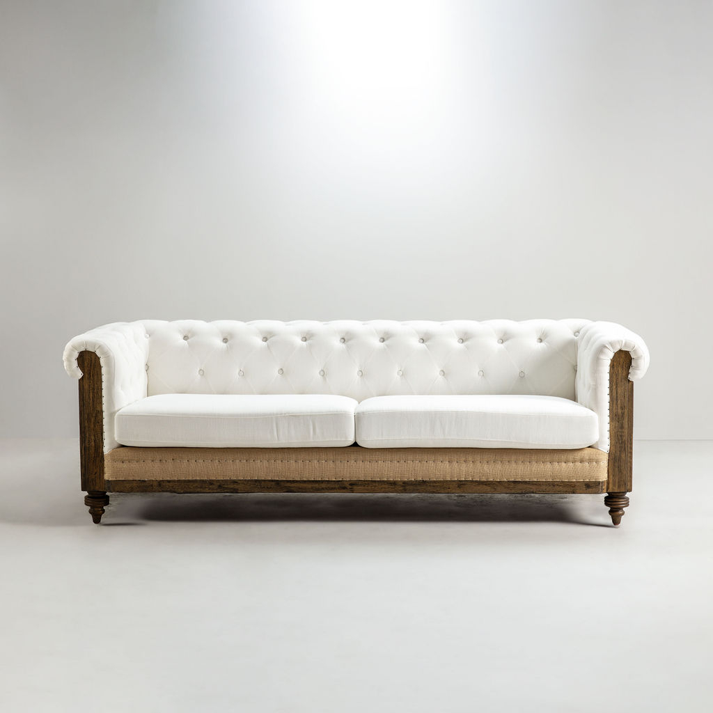 cream upholstered vintage deconstructed sofa