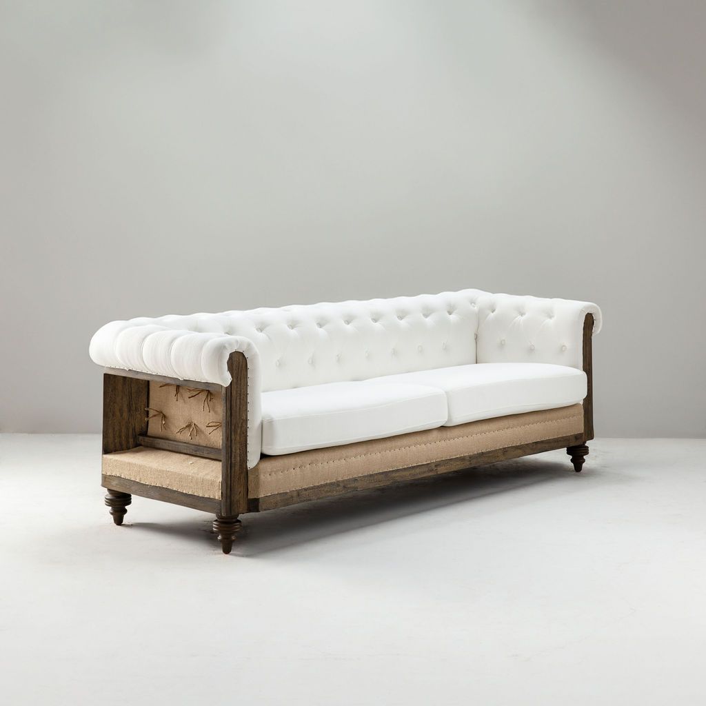 deconstructed chesterfield style sofa with wooden frame