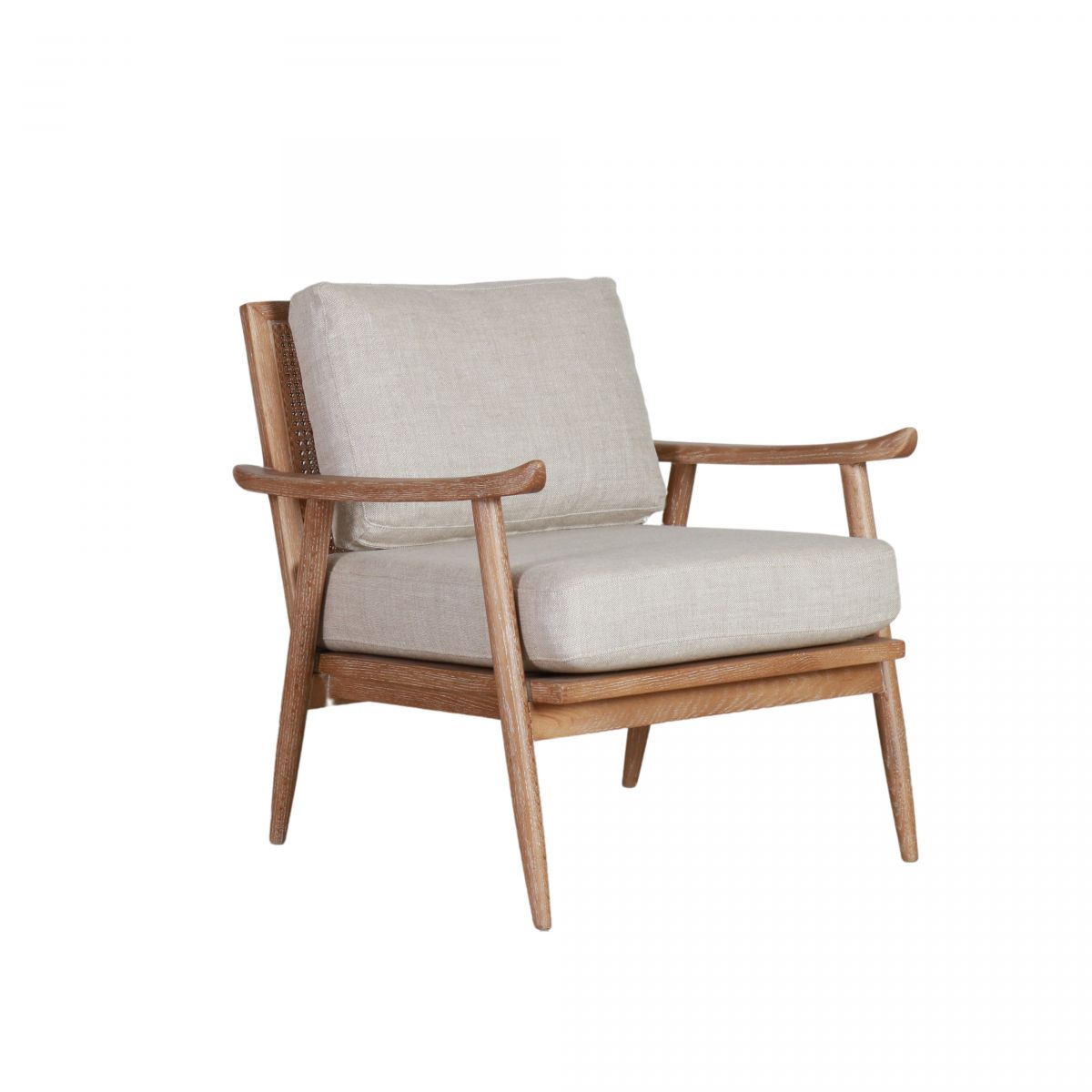 modern armchair with rattan back and linen seat and back cushion