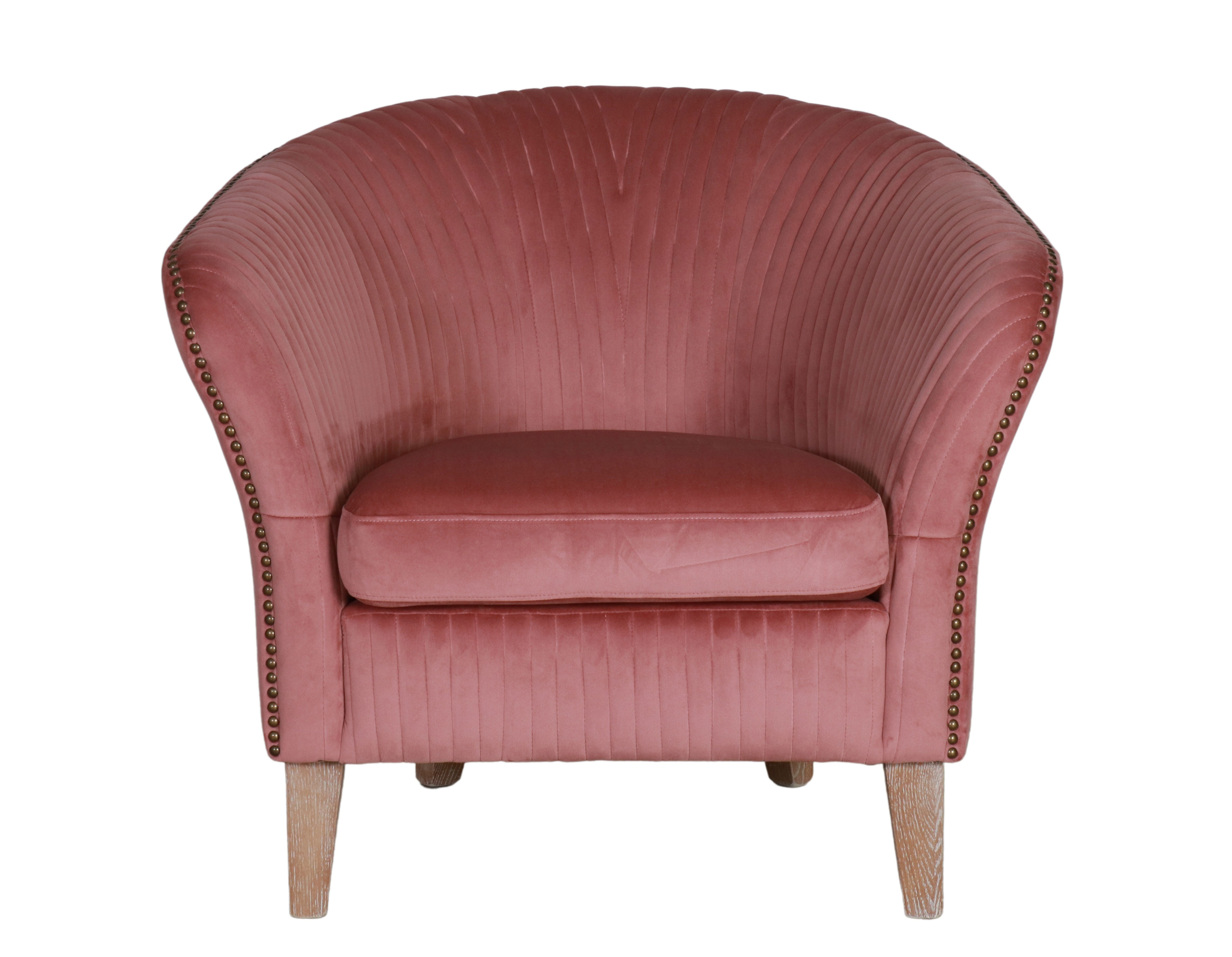 blush velvet armchair with stud detail 