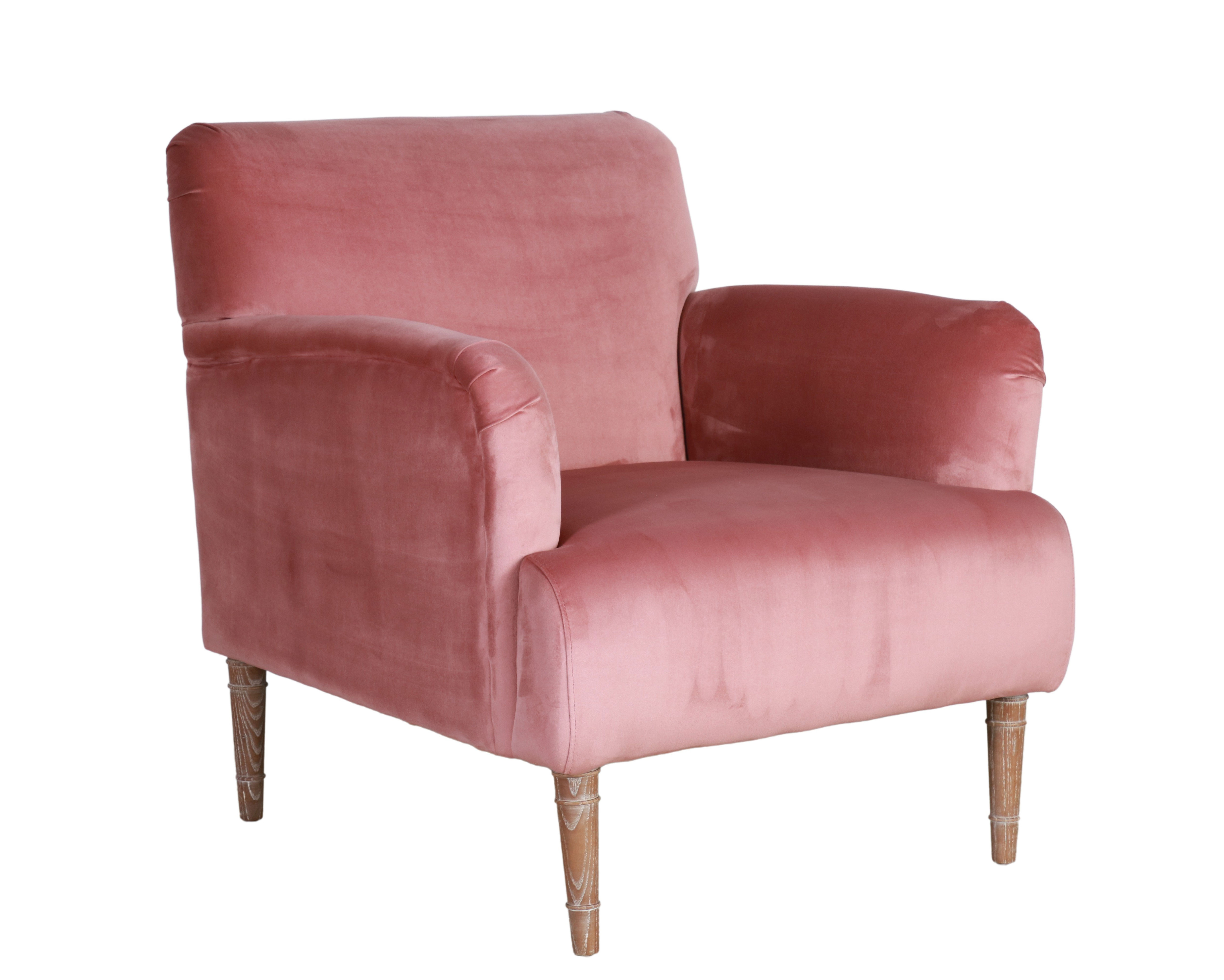 blush velvet upholstered armchair with oak legs