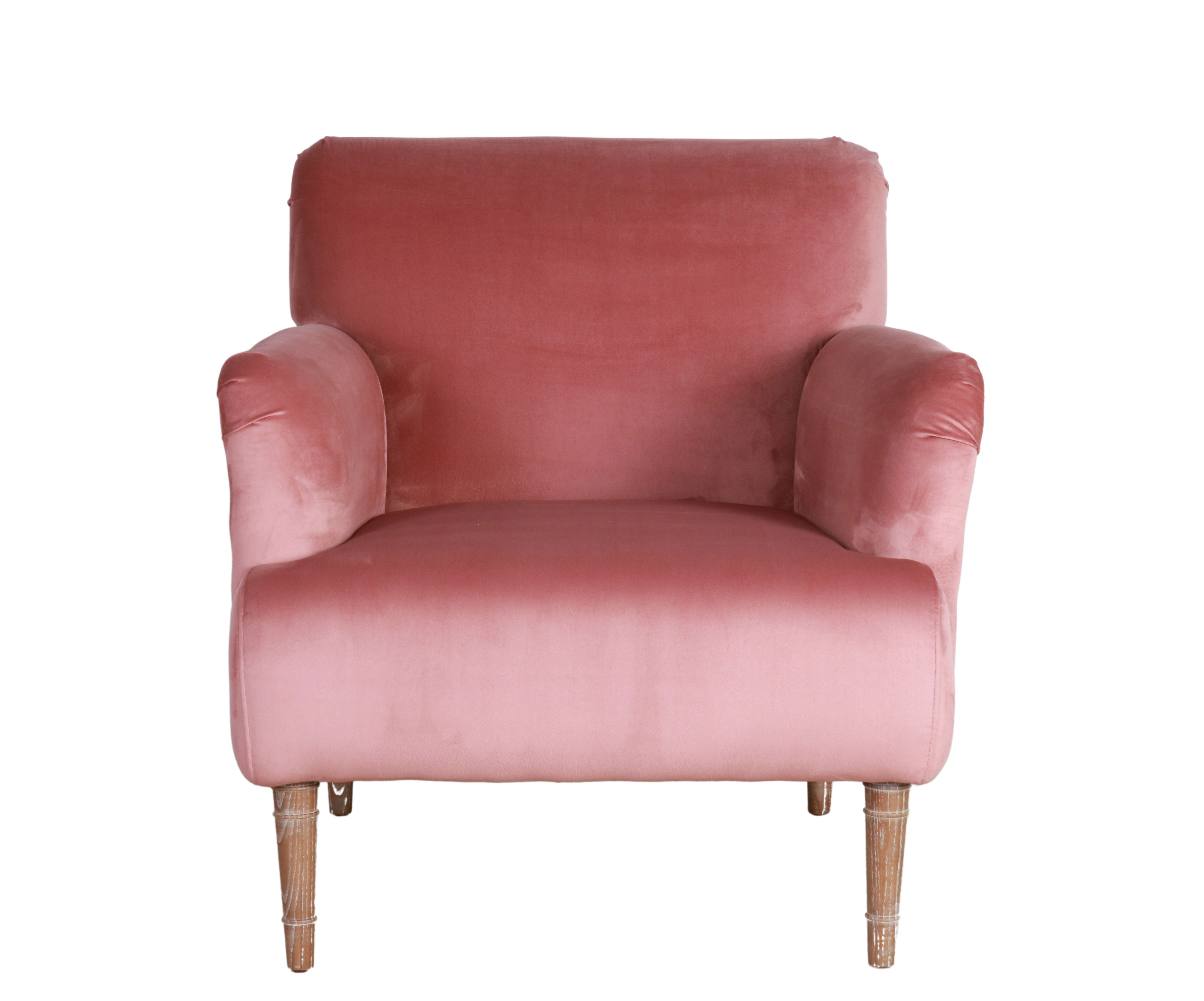 blush velvet upholstered armchair with oak legs