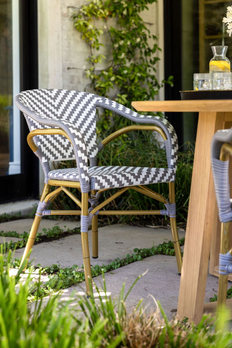 Grey and white synthetic arm chair