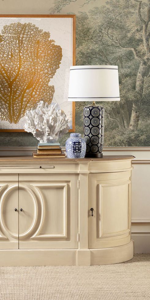 Blue geometric ceramic lamp base with white shade 