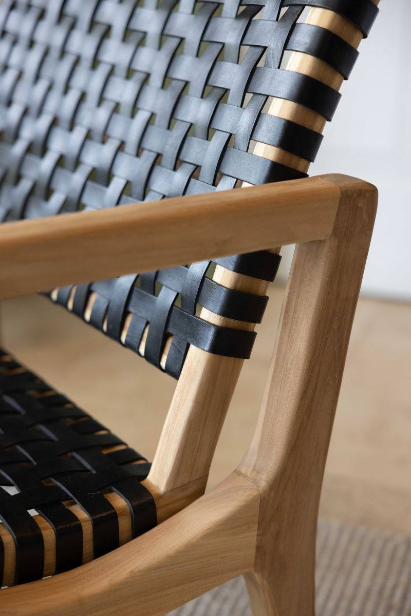 Block and chisel teak and leather armchair 