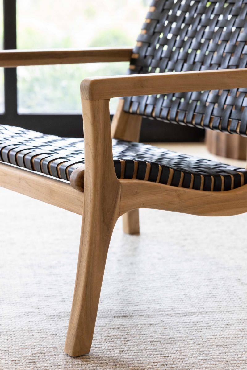Block and chisel teak and leather armchair 