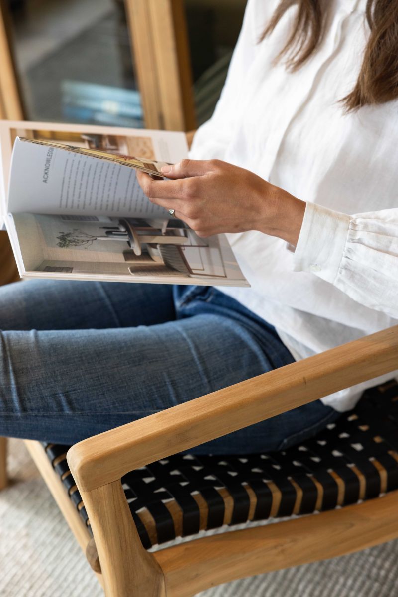 Block and chisel teak and leather armchair 
