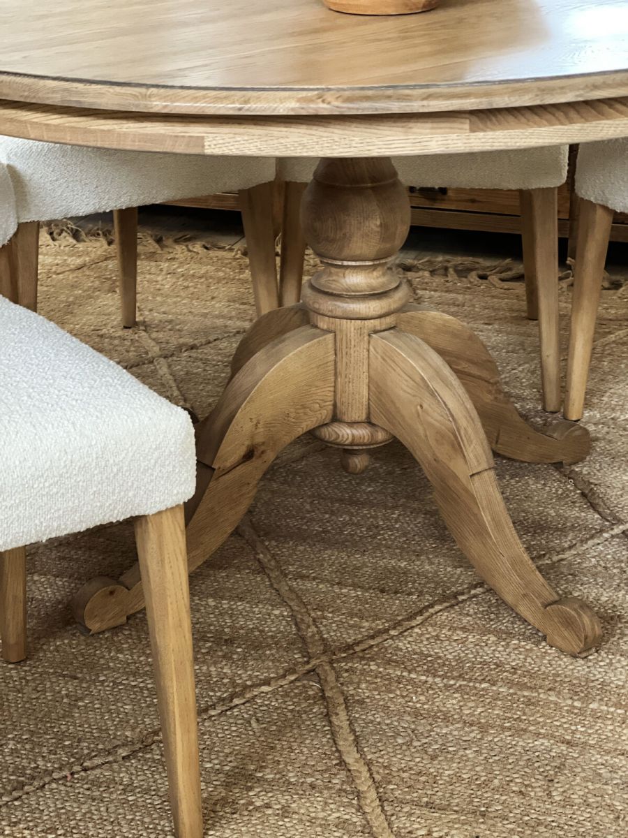 Round dining table in solid weathered oak