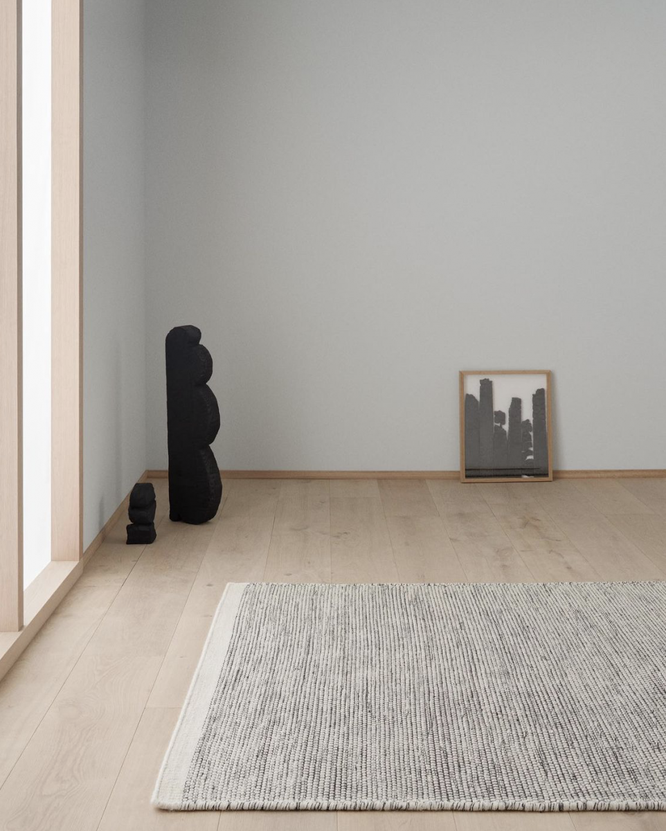 Block & Chisel white/black wool rug with white trim