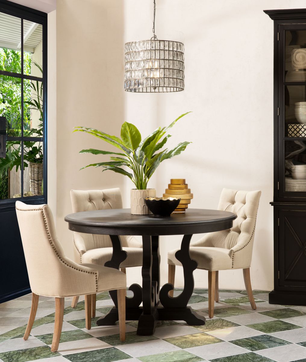 dark wood round dining table with decorative base Château Collection 