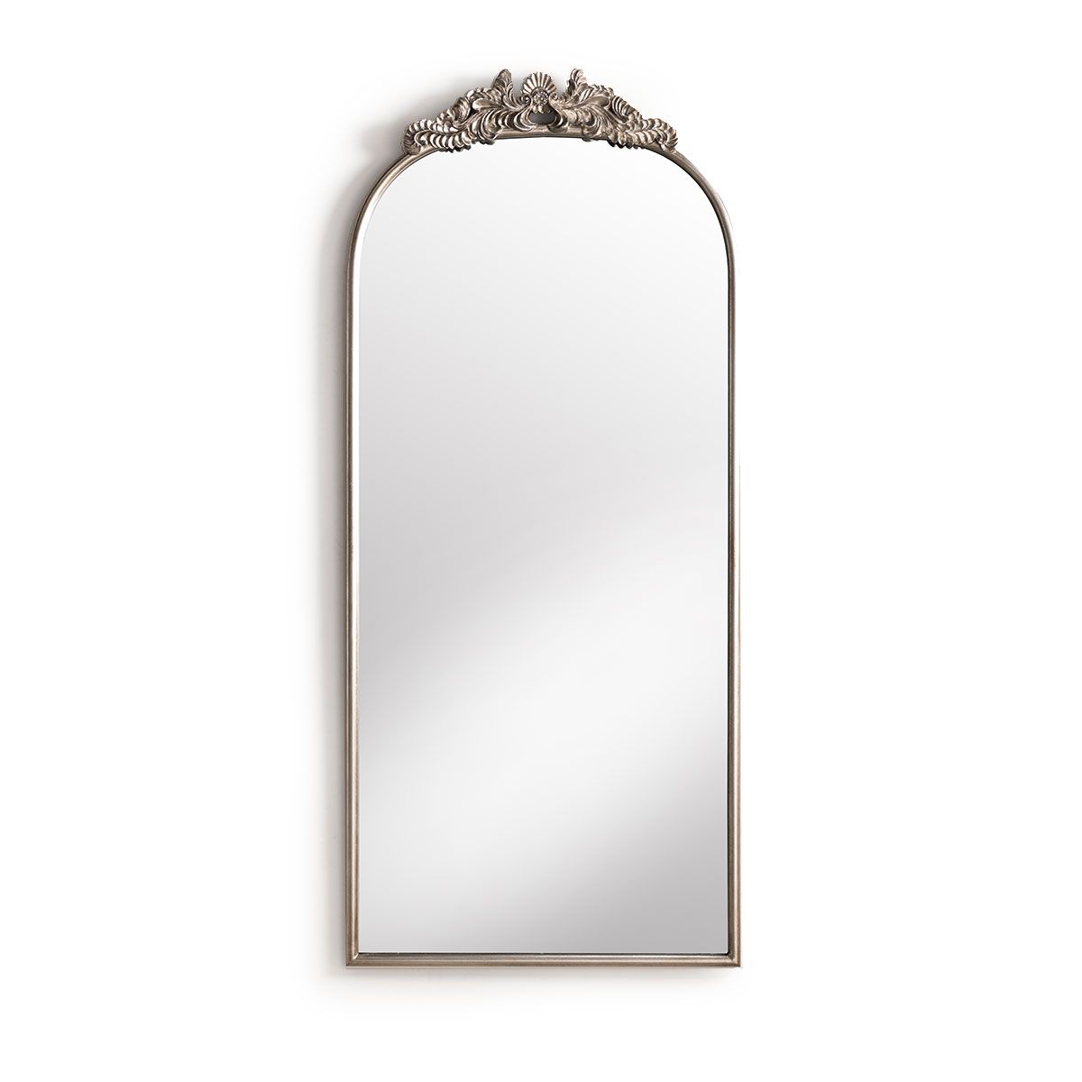 silver framed mirror with ornate top