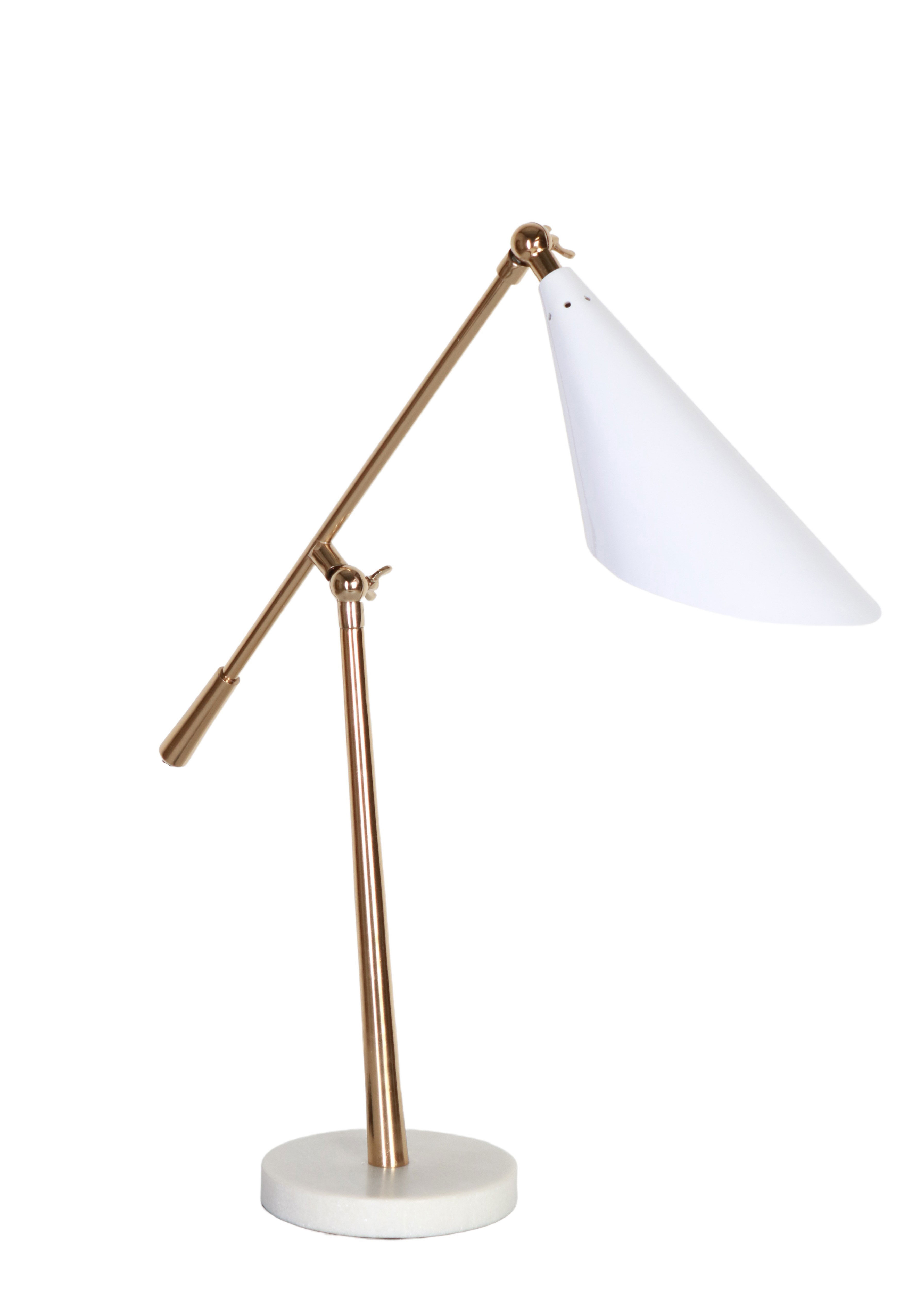 white and brass desk lamp