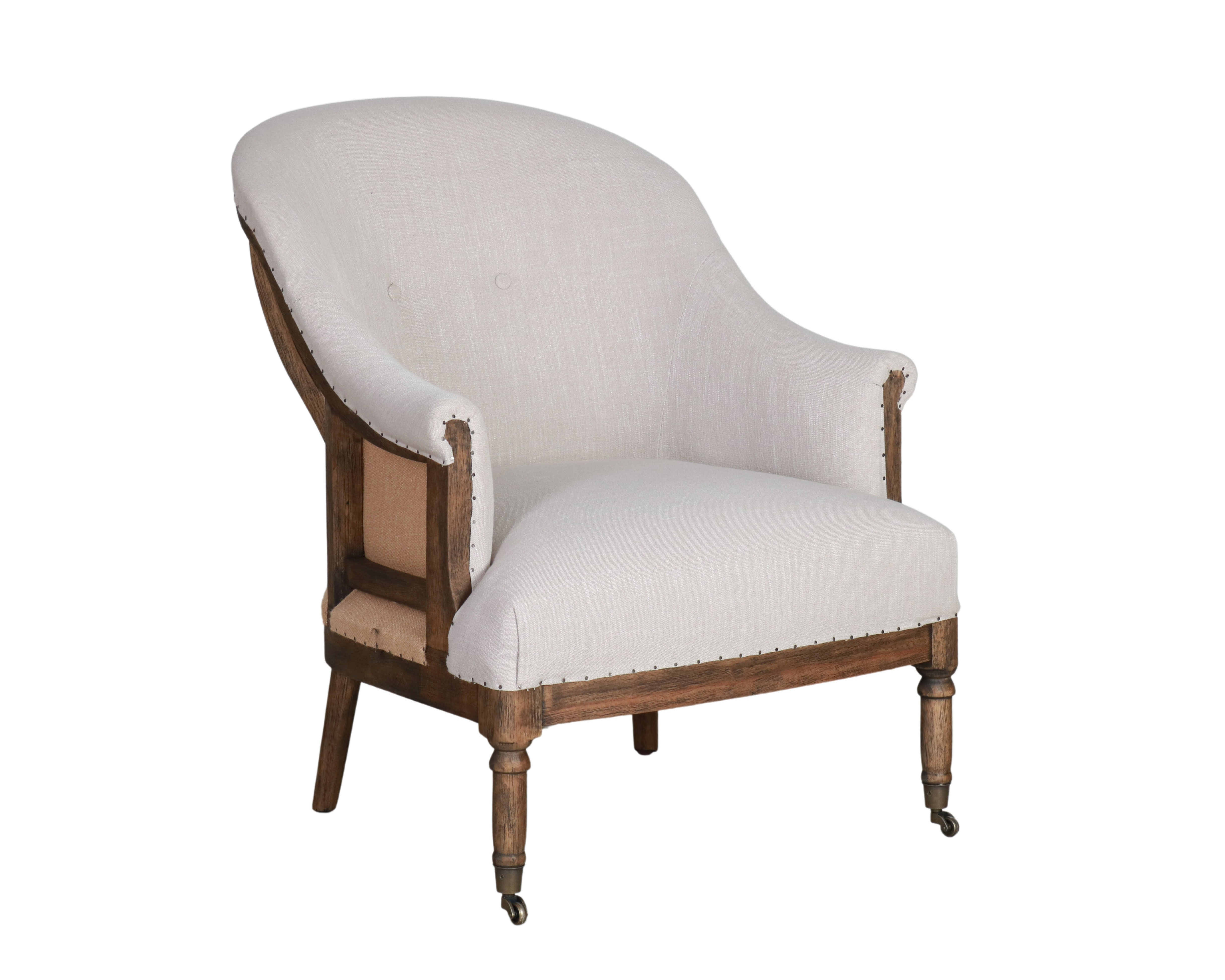 Linen upholstered deconstructed armchair on castors.