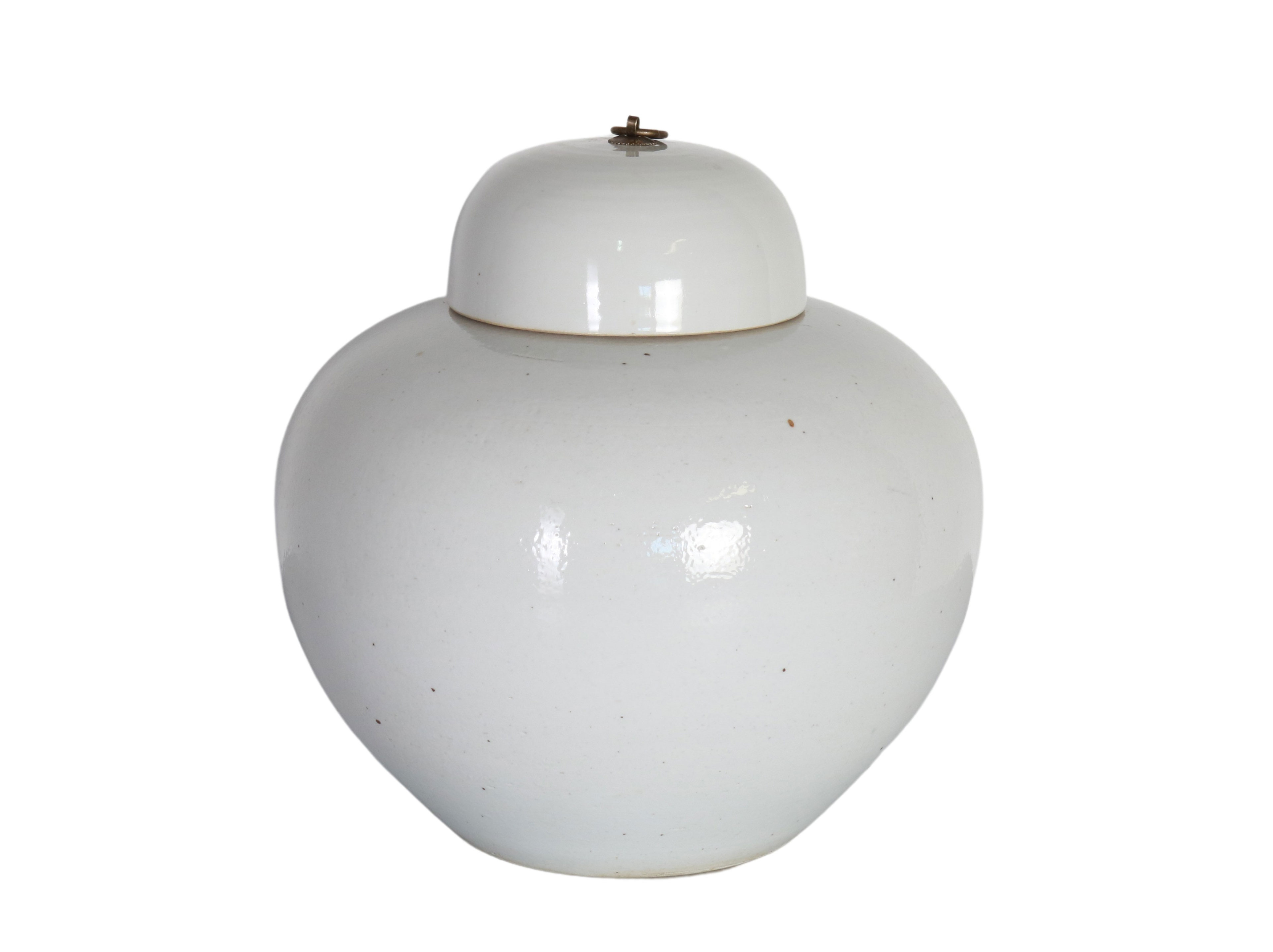 white ceramic jar with lid 