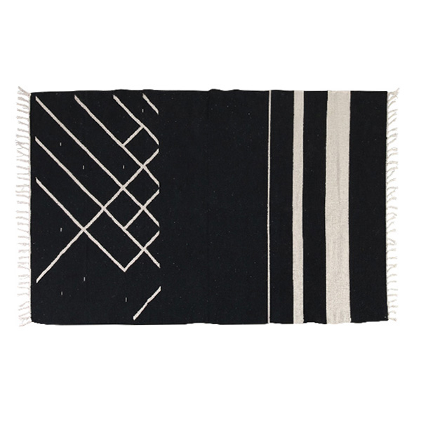 black and white cotton rug with tassels