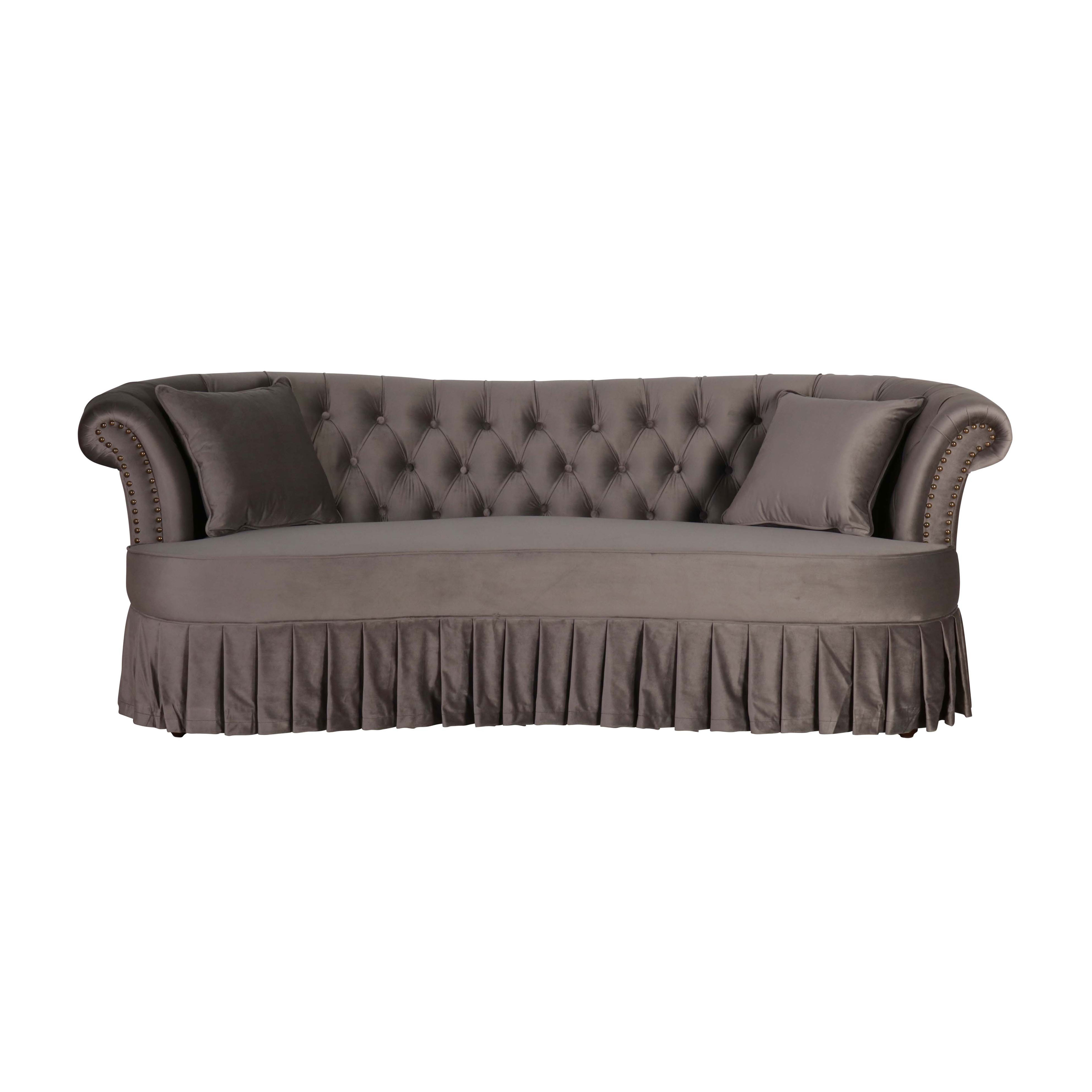 grey velvet french style sofa with deep buttoned back and pleated skirt detail