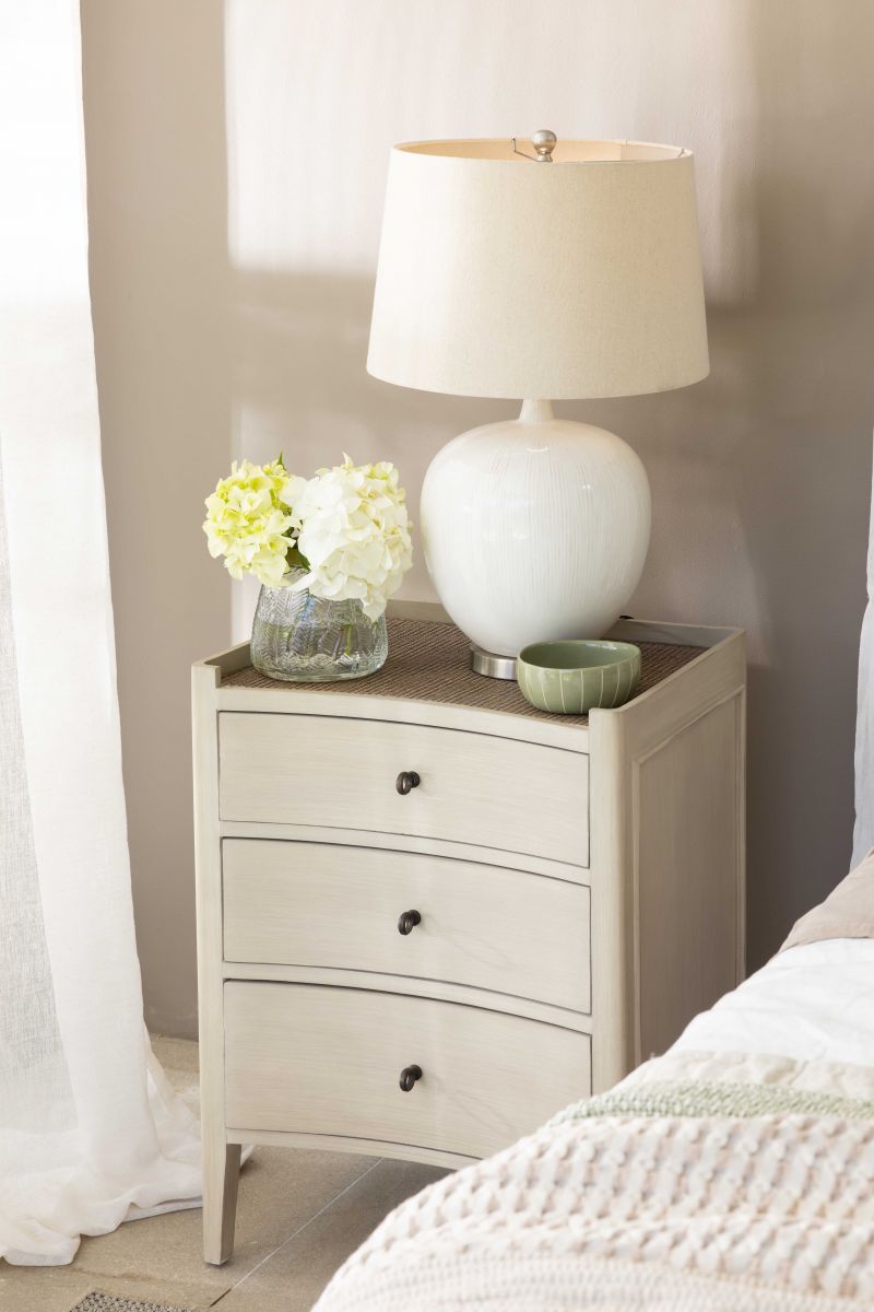 Block & Chisel wooden bedside table with rattan top shelf