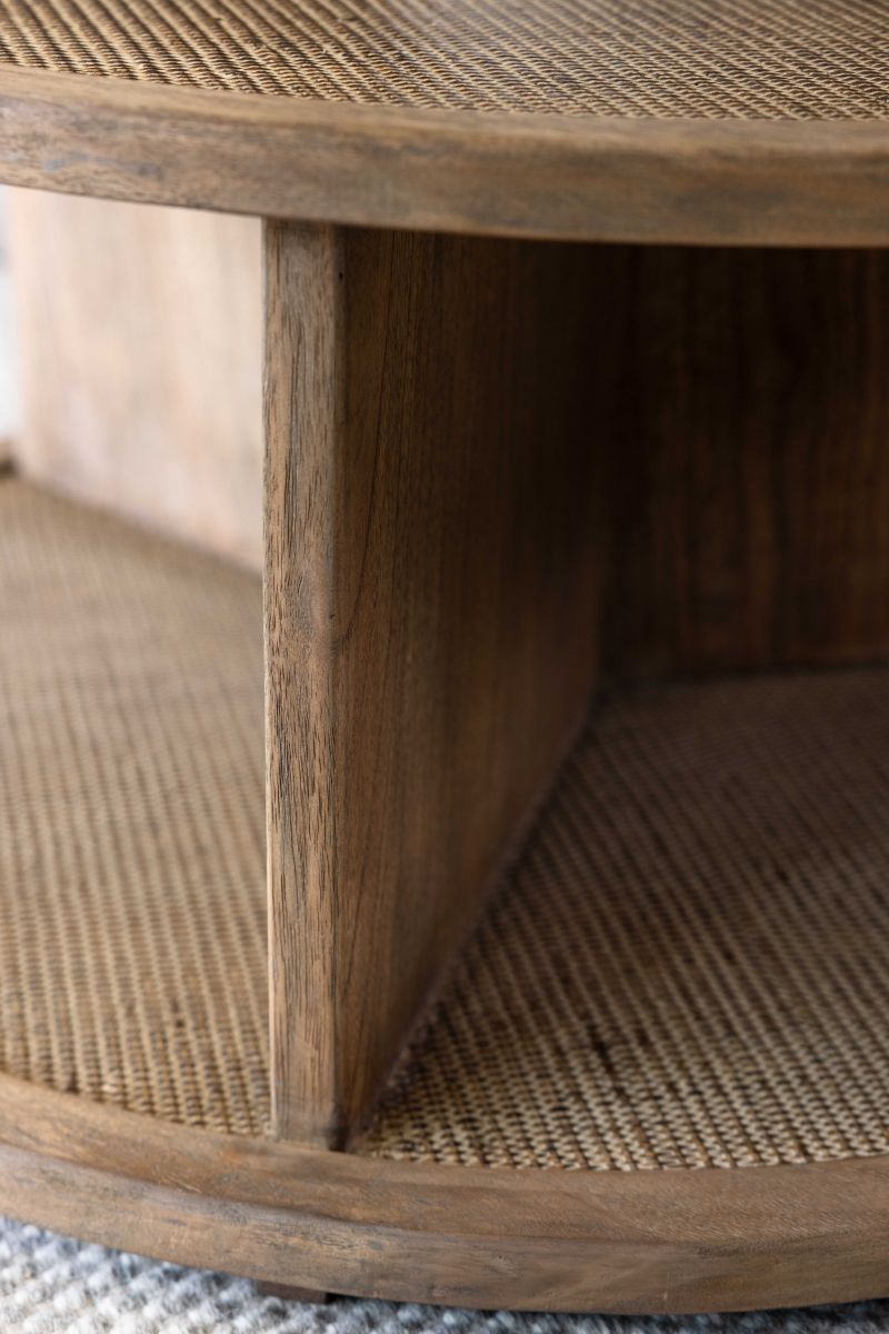 round wooden coffee table with rattan inlay