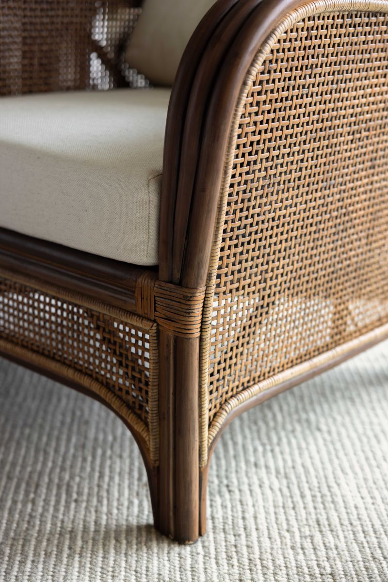 Cane and rattan wingback chair with footstool 