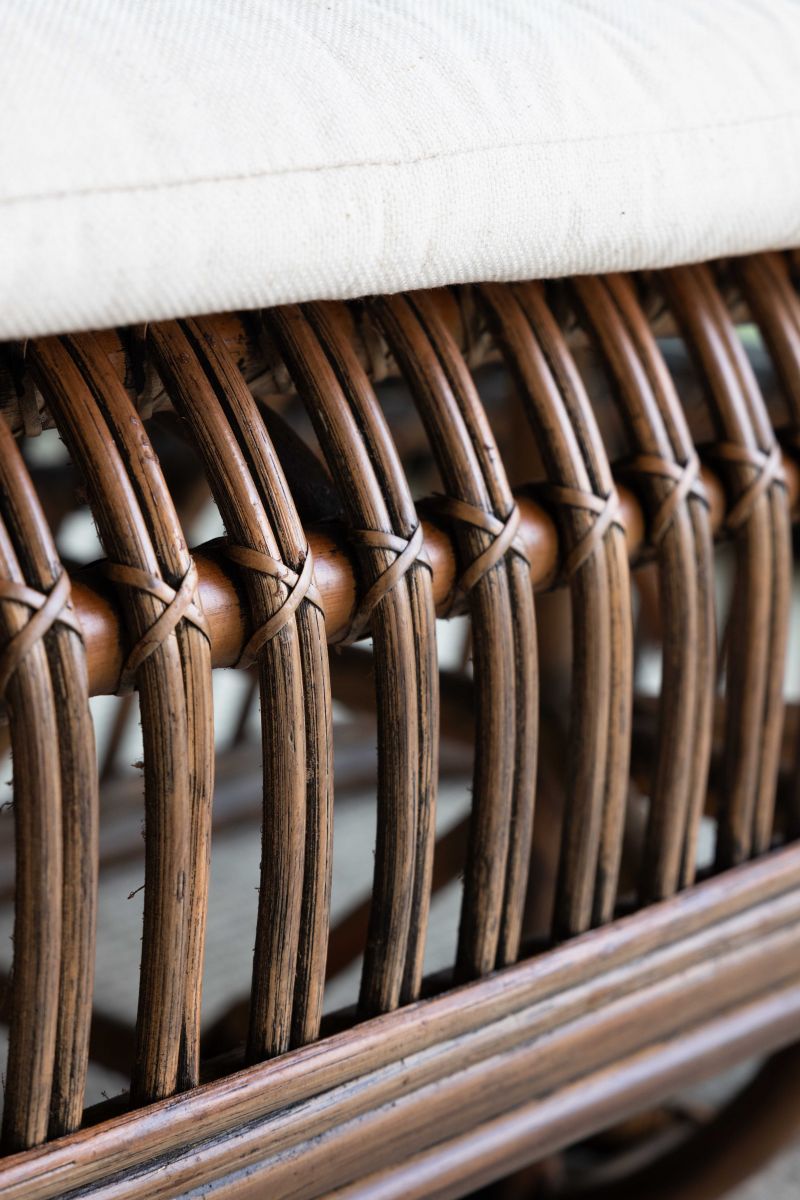 cane and rattan small sofa with seat cushion