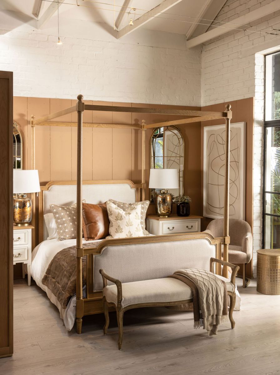 wooden 4 poster bed with fabric headboard and footboard