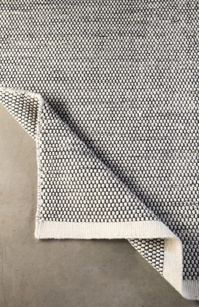 Block & Chisel white/black wool rug with white trim
