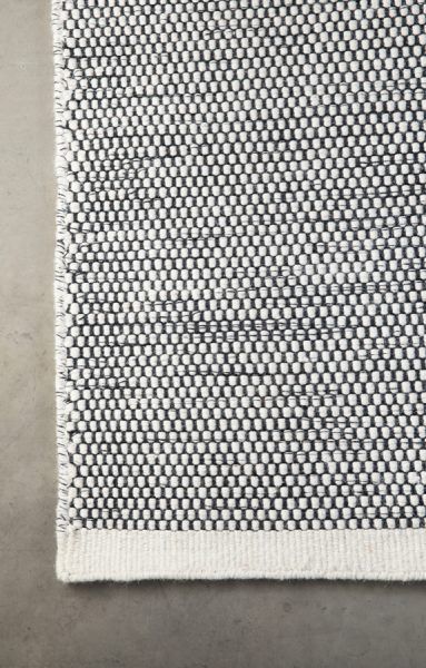 Block & Chisel white/black wool rug with white trim