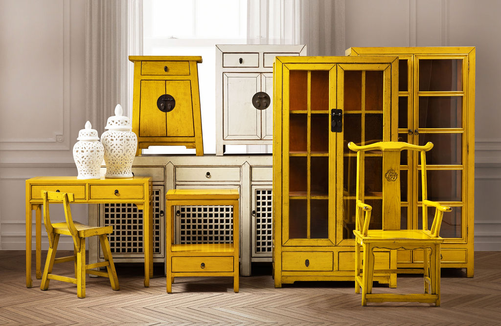 yellow lacquered chinese cabinet with glass doors