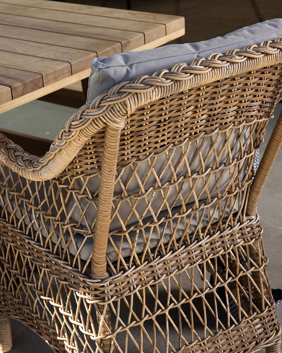 Outdoor armchair in synthetic rattan with cushions